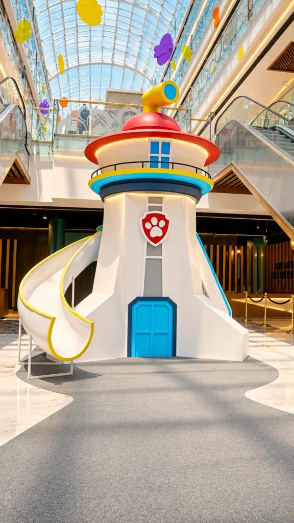 Colourful Lighthouse Play Tower in a Skylit Mall_converted