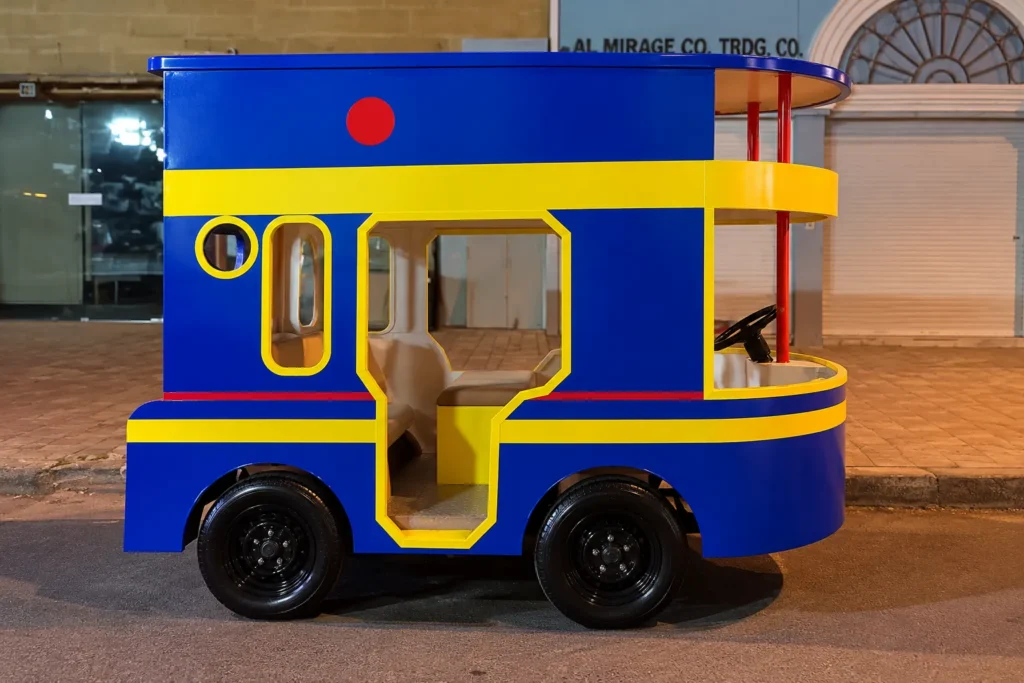 Colourful Mini Tram Outside City Shops_converted